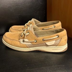 SPERRY’s womans size  8.5 medium. Tan with gold accents